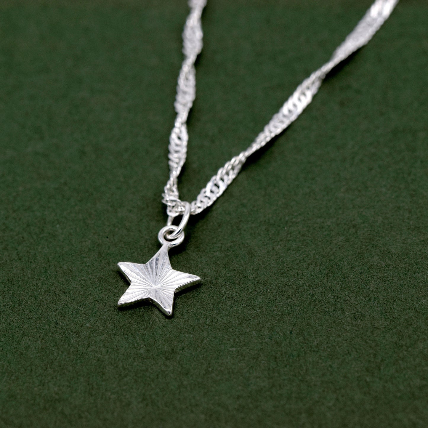 Sterling Silver D/C Fluted Star Pendant Necklace on Singapore Chain