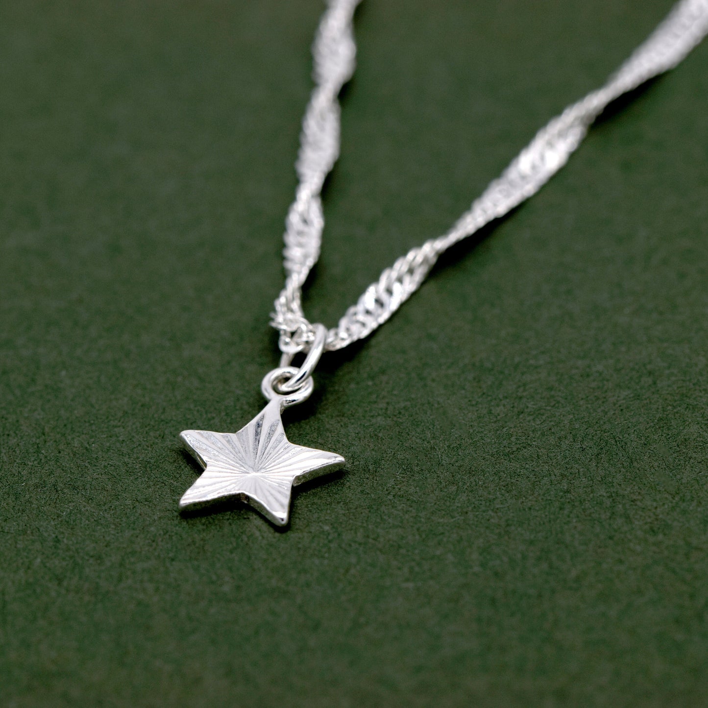 Sterling Silver D/C Fluted Star Pendant Necklace on Singapore Chain