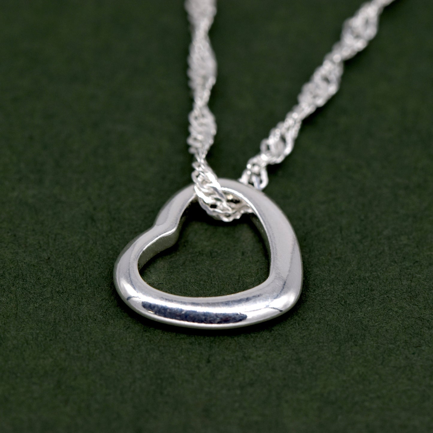 Sterling Silver Open Floating Heart Pendant Necklace on Singapore Chain