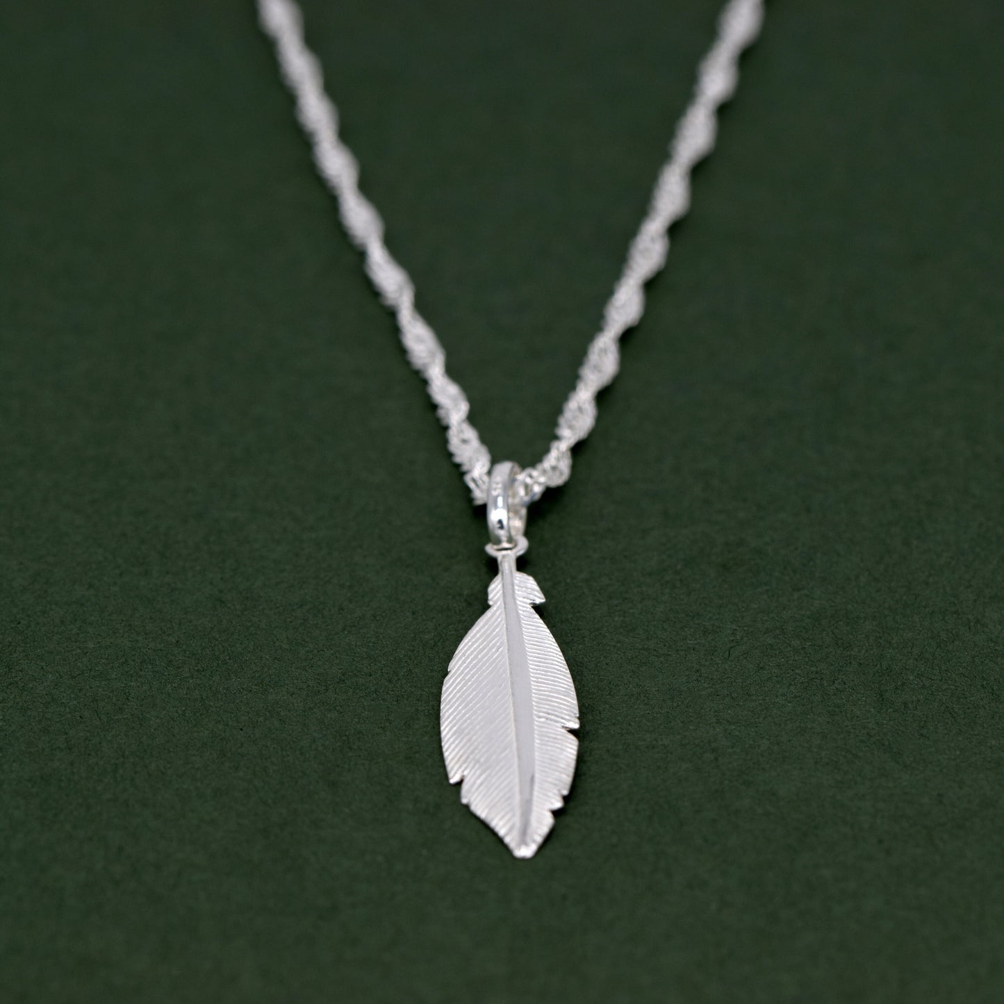 Sterling Silver Feather Pendant Necklace on Singapore Chain