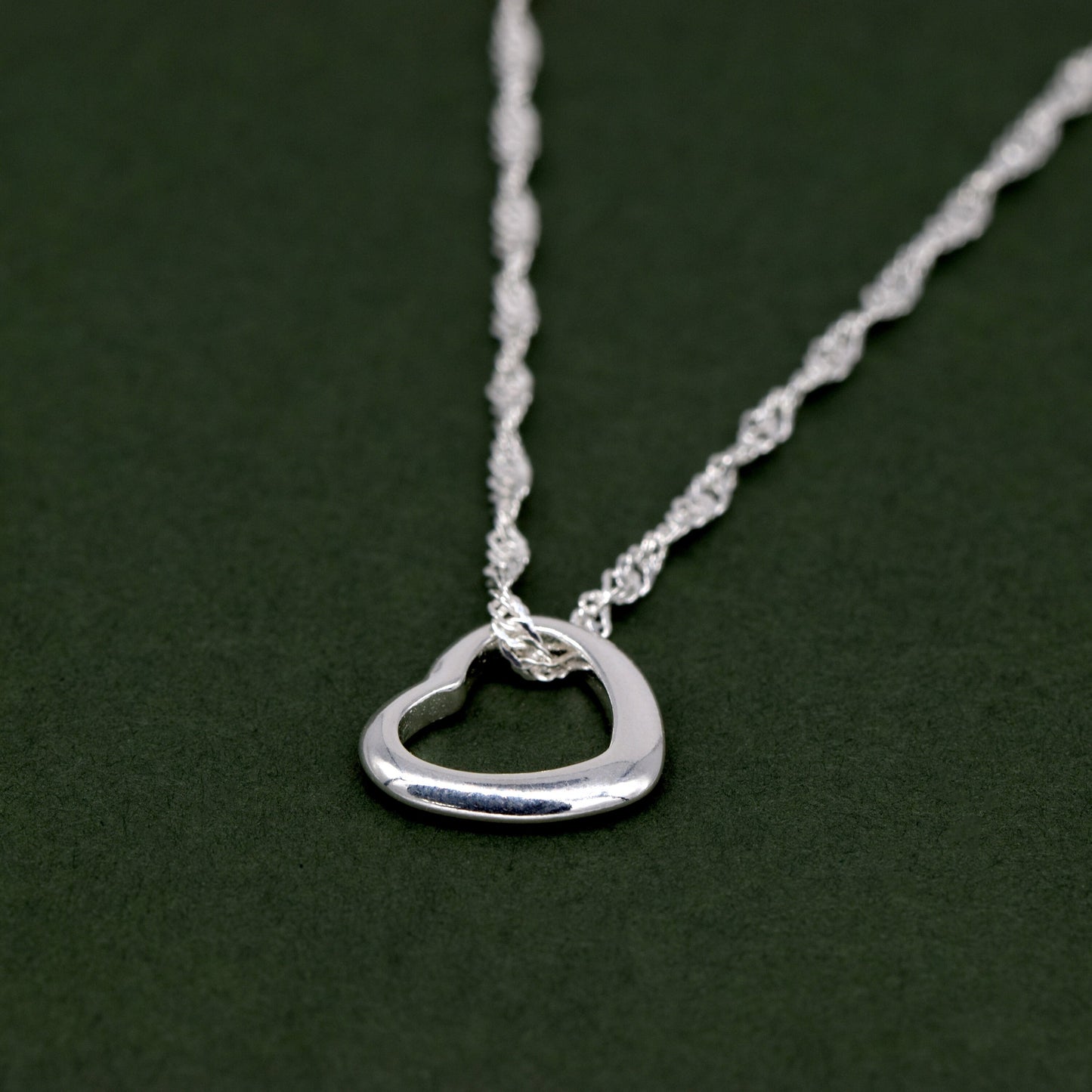 Sterling Silver Open Floating Heart Pendant Necklace on Singapore Chain