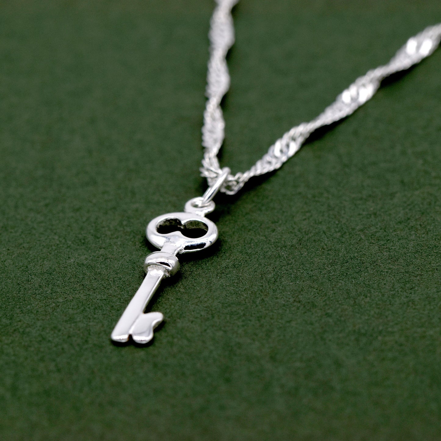 Sterling Silver Key Pendant Necklace on D/C Singapore Chain