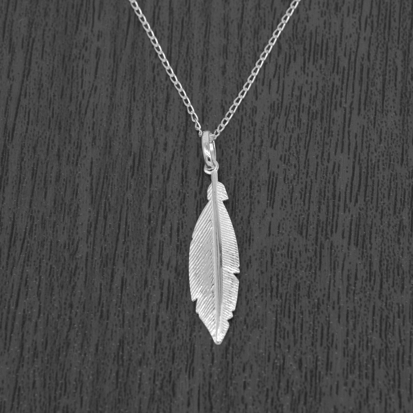 Sterling Silver Feather Pendant Necklace on Curb Chain