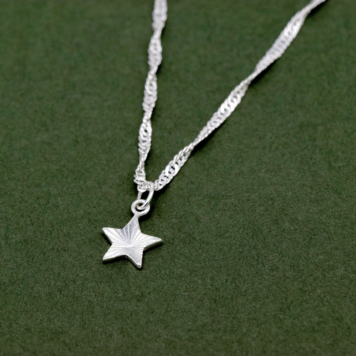 Sterling Silver D/C Fluted Star Pendant Necklace on Singapore Chain