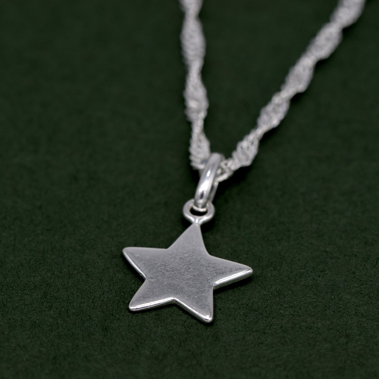 Sterling Silver Star Pendant Necklace on Singapore Chain
