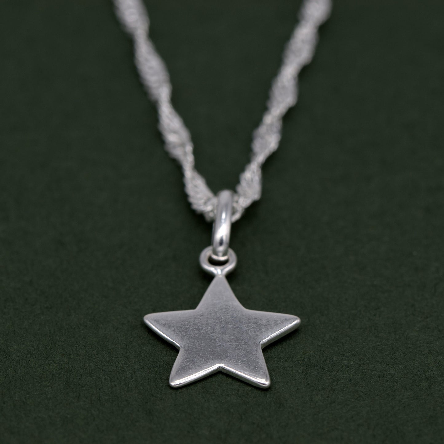 Sterling Silver Star Pendant Necklace on Singapore Chain