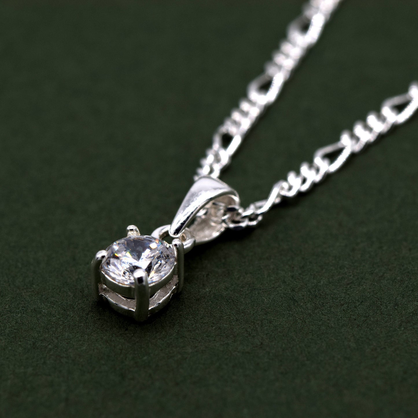 Sterling Silver Round Cubic Zirconia Pendant Necklace on D/C Figaro Chain