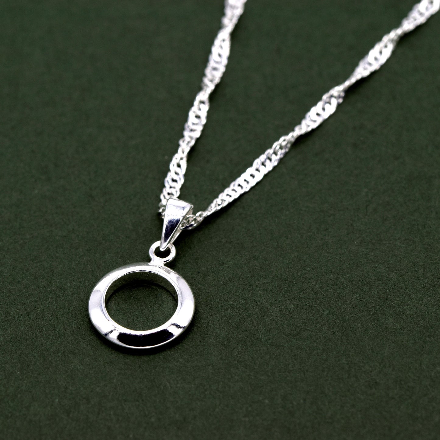 Sterling Silver Circle Of Life Round Pendant Necklace on D/C Singapore Chain