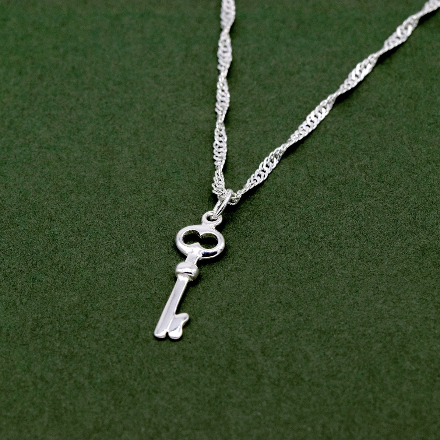 Sterling Silver Key Pendant Necklace on D/C Singapore Chain