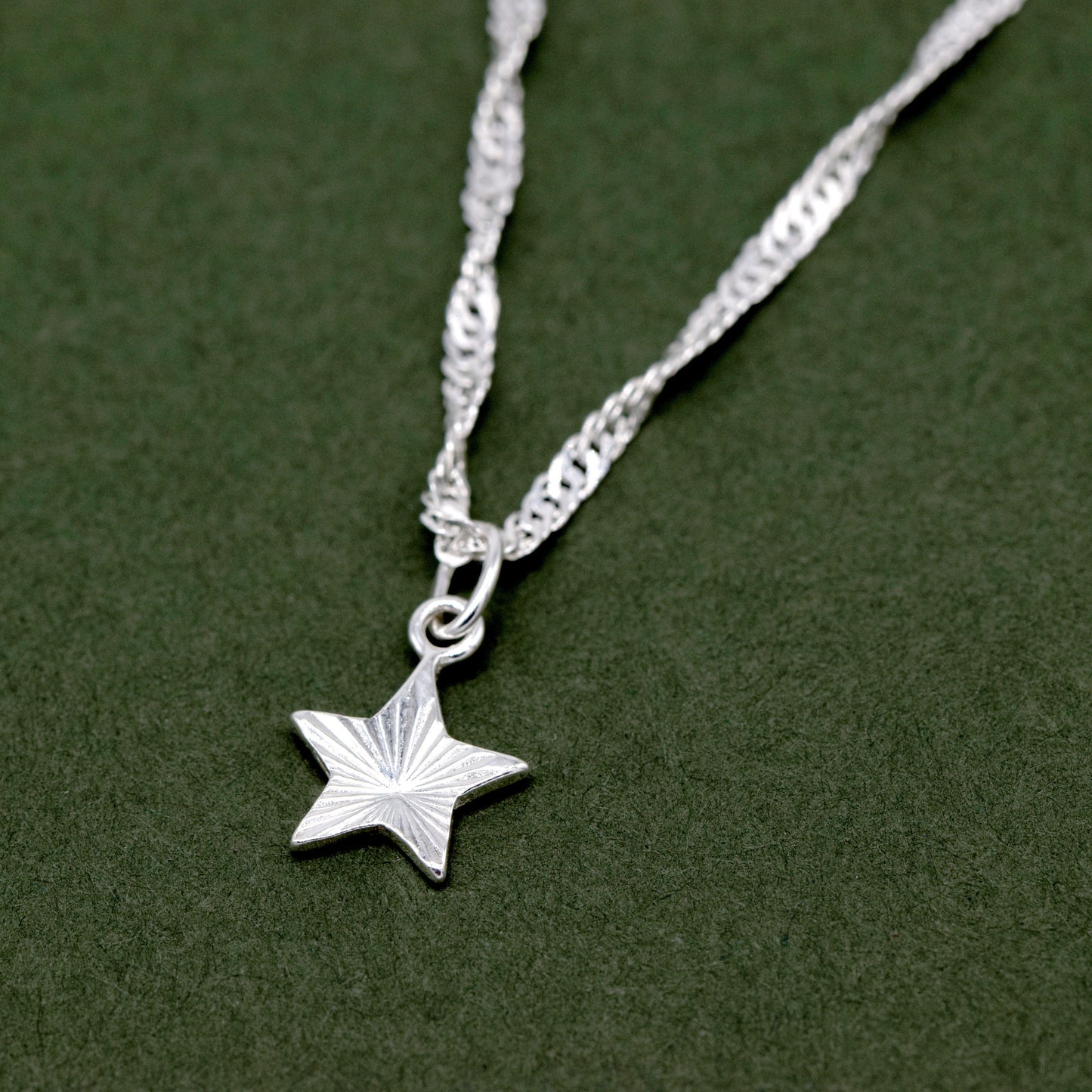 Sterling Silver D/C Fluted Star Pendant Necklace on Singapore Chain