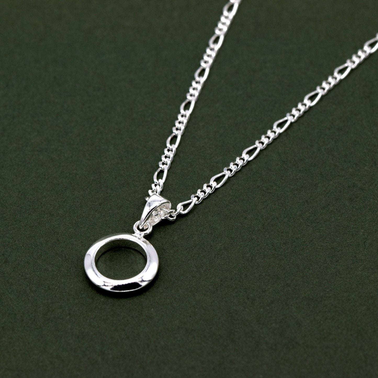 Sterling Silver Circle Of Life Round Pendant on Figaro Chain