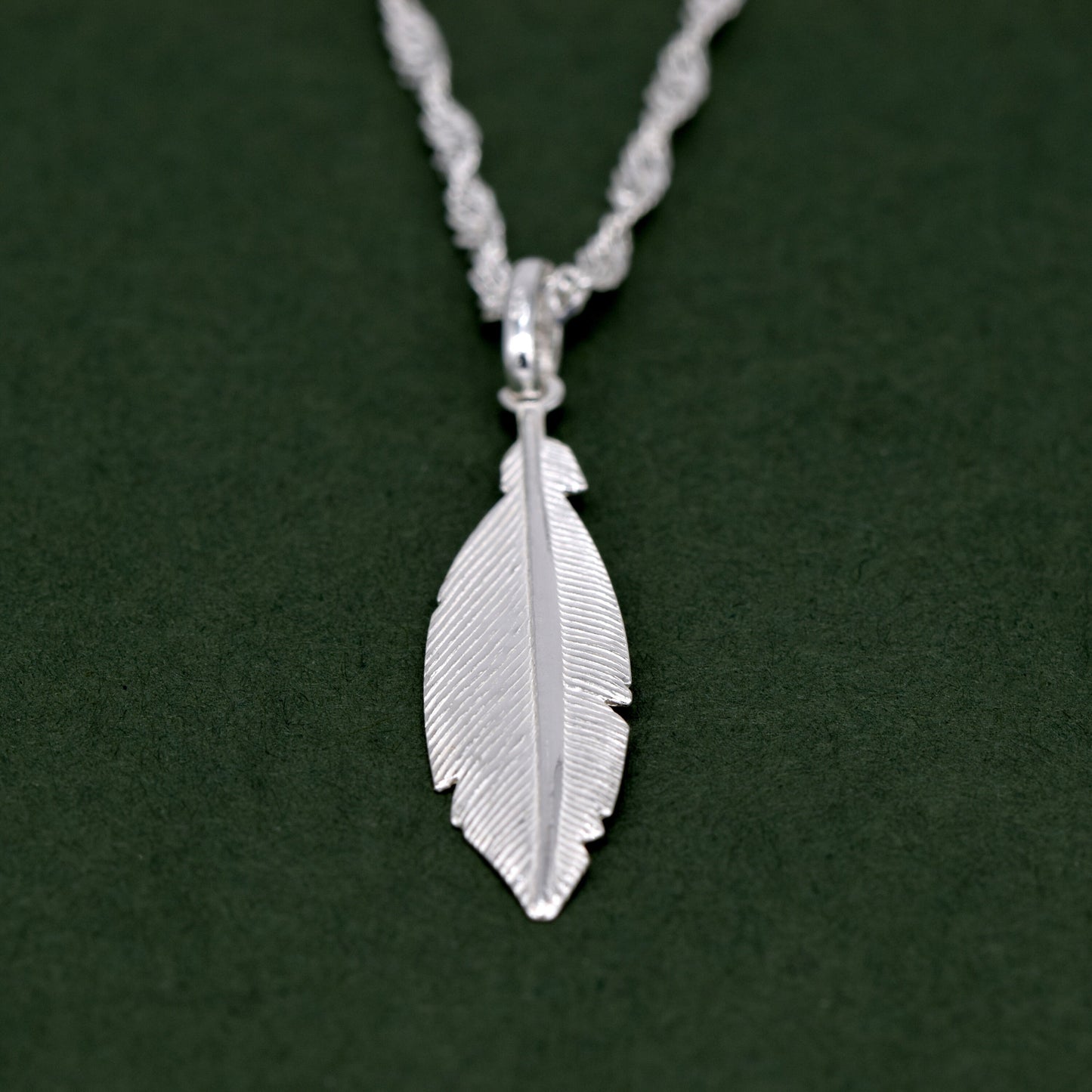 Sterling Silver Feather Pendant Necklace on Singapore Chain