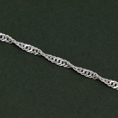 Sterling Silver 10" Singapore Chain Anklet With Feather Pendant