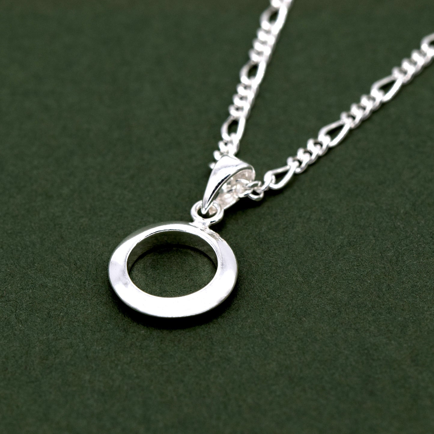 Sterling Silver Circle Of Life Round Pendant on Figaro Chain