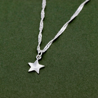 Sterling Silver D/C Fluted Star Pendant Necklace on Singapore Chain