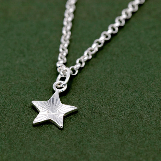 Sterling Silver Diamond Cut Fluted Star Pendant On Rolo Chain